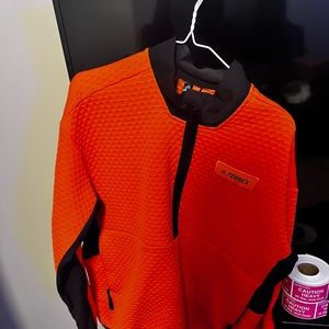 lightweight warmth of the adidas Terrex Hike Half-Zip men's fleece pullover.